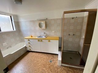 Old Main Bathroom Before Renovation — Luxury Home Builders in Gold Coast, NSW